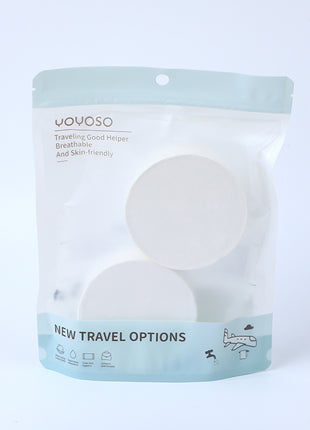 2 compressed bath towels (round).