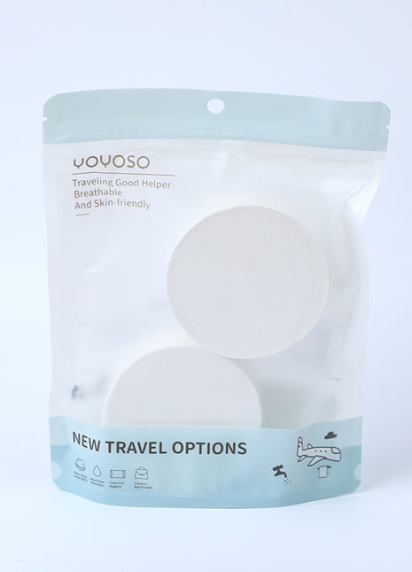 2 compressed bath towels (round).