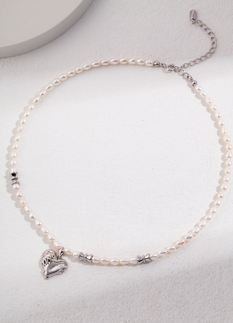 Silver heart pearl earrings E0911